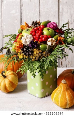 Colorful bouquet made of autumn flowers and plants
