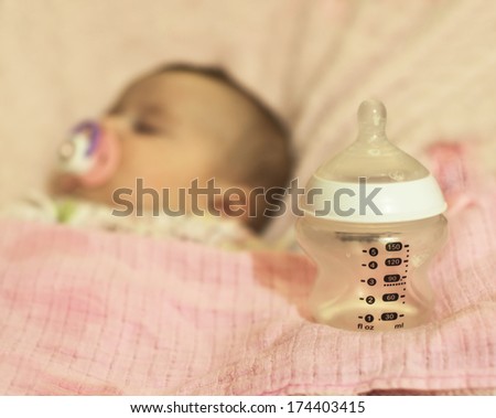 baby and bottle.bottle feeding concept