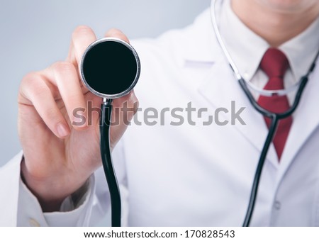 Doctor with stethoscope in a hospital