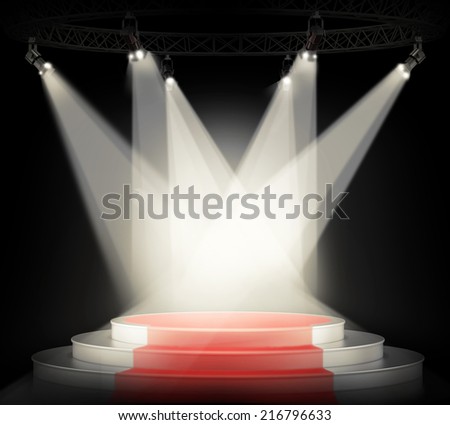 Illuminated empty stage podium with red carpet for award ceremony