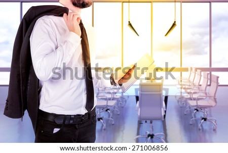 Hipster business man  with digital tablet on blurred background office. High resolution.