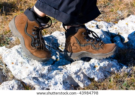 hiking boots at rocks