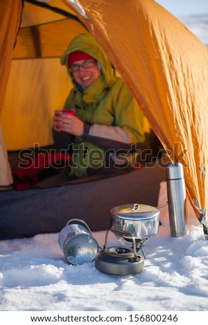 Camping during winter hiking in Carpathian mountains