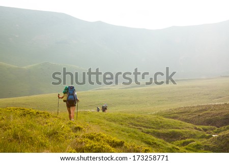 Young People Are Hiking In Carpathian Mountains In Summertime