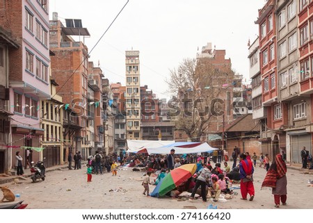 People are waiting for earthquake aftershocks sitting on open space in Kathmandu city in Nepal, after main hit on April 25, 2015