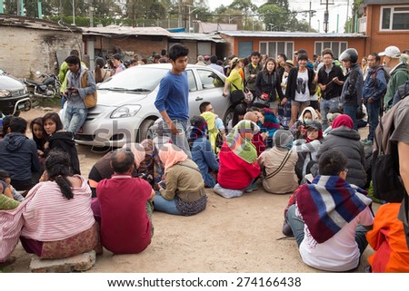 People are waiting for earthquake aftershocks sitting in open space in Kathmandu city in Nepal, after main hit on April 25, 2015