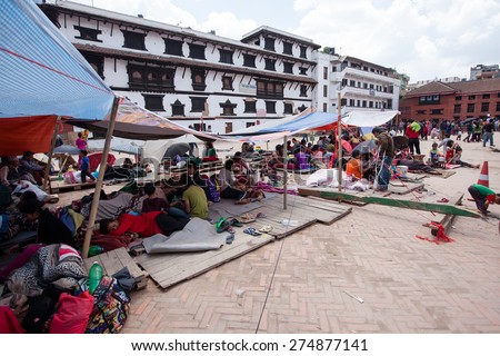 KATHMANDU, NEPAL - APRIL 27, 2015: Frightened people and homeless stay the 3rd day at the open spaces and squares of Kathmandu after 7.8 earthquake