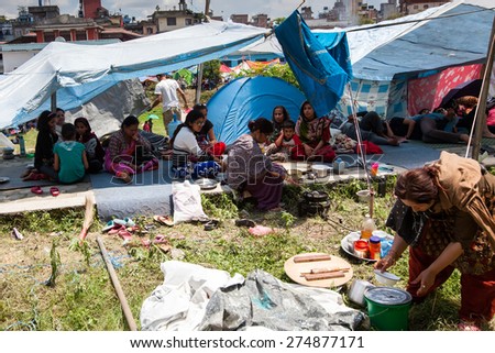 KATHMANDU, NEPAL - APRIL 27, 2015: Frightened people and homeless stay the 3rd day at the open spaces and squares of Kathmandu after 7.8 earthquake