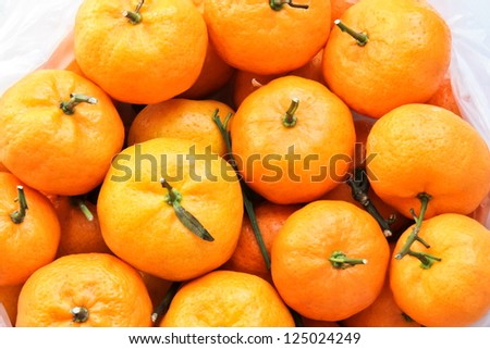 The oranges wait for someone to buy it