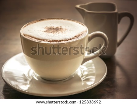 delicious cup of hot coffee in afternoon