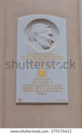 Vilnius, Lithuania - February 22, 2014: Memorial plaque of Pope John Paul II on the wall of Dominican Church of Holy Spirit in Vilnius