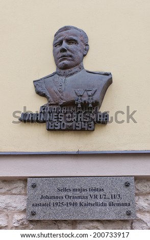 Tallinn, Estonia - May 27, 2014: Memorial plaque of Johannes Orasmaa, military leader and commander of Estonian Defence League (Kaitseliit). Historic center of Tallinn, Estonia (UNESCO site)
