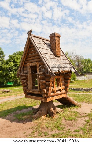 Dmitrov, Russia - June 07, 2014: Russian fairy tale house in Children park of Dmitrov, Moscow Region, Russia. In Russian folklore such house is a residence of witch Baba Yaga