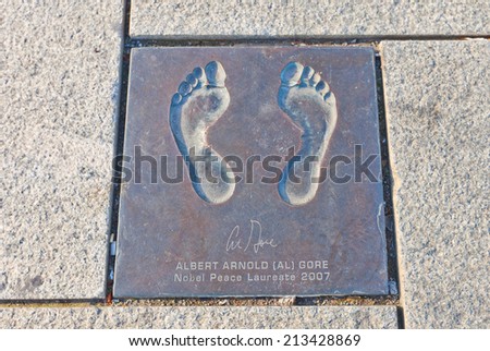 STAVANGER, NORWAY - AUGUST 16, 2014: Bronze cast of bare feet of Albert Arnold Gore, Nobel Peace laureate in Stavanger, Norway. Part of Path of Peace, the project of human rights foundation