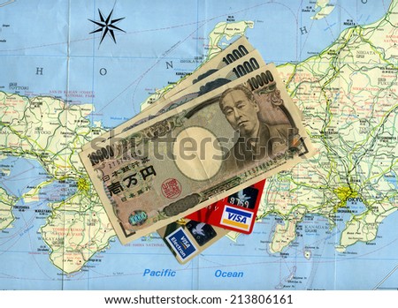 MOSCOW, RUSSIA - AUGUST 29, 2014: Concept traveling to Japan. Japanese money (yens), Visa credit cards, Japan map