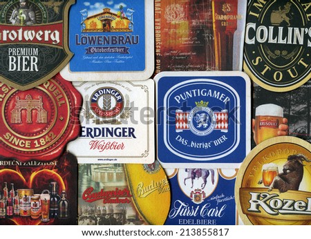 MOSCOW, RUSSIA - AUGUST 29, 2014: Beermats (bierdeckel) background. Various beer trademarks