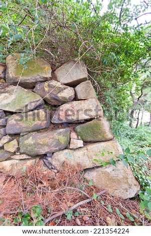 BUSAN, SOUTH KOREA - SEPTEMBER 25, 2014:  Stone walls, the only survived structure of Busan castle in Busan town (Republic of Korea). Was built by Japanese invaders in 1592 during Imjin War