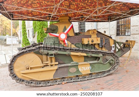 WARSAW, POLAND - OCTOBER 20, 2014:  French light tank Renault FT-17 (circa 1917) in Museum of Polish Army in Warsaw, Poland. The progenitor of most contemporary tanks