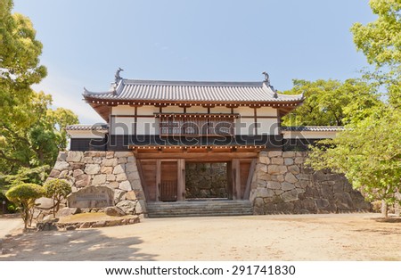 SHIKOKUCHUO, JAPAN - MAY 22, 2015: Yaguramon style gate of Kawanoe castle in Shikokuchuo city, Shikoku Island, Japan. Castle was erected in 1337, reconstructed in 1984