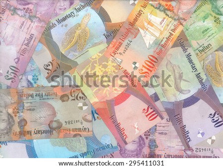 GEORGE TOWN, CAYMAN ISLANDS - JULY 05, 2015: Cayman Islands (British Overseas Territory) currency (Cayman dollars) background