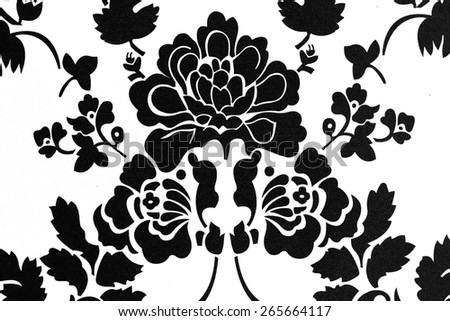 Photo of Pattern of black flowers On a white background