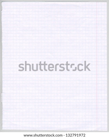 Checkered sheet of school notebook on a gray background