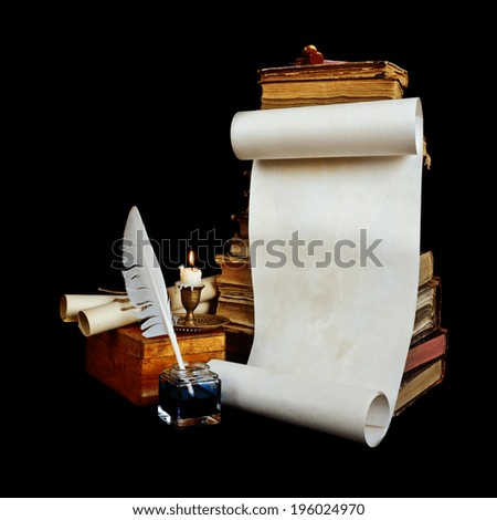 Still life with a letter, a pen, a lighted candle in copper candlestick on a background of old books