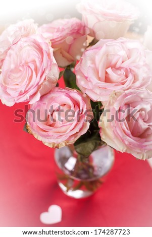 Roses bouquet with fake bokeh effect in a vase