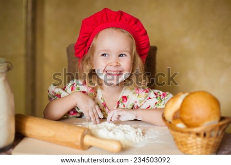 beautiful  smiling  little blonde girl  in  red beret with french bread fresh trendy summer spring joy happy look cute studio impressions lady