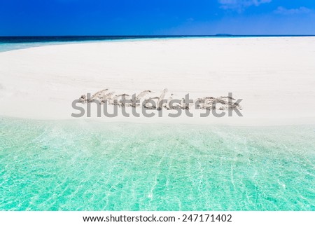 inscription letters  of sea tropical  Maldives  romantic  atoll island paradise luxury  resort about coral reef