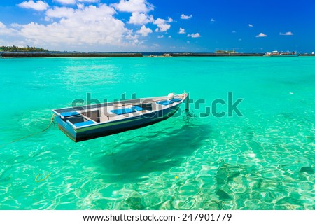 beautiful boat Maldives  atoll island paradise luxury  resort about coral reef in transparent water