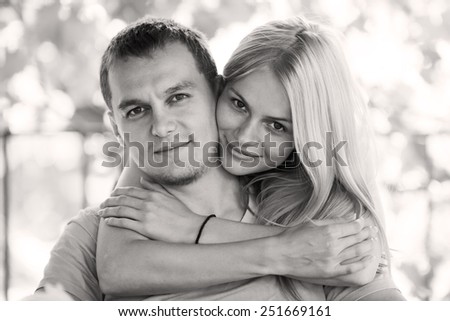 blonde woman and man feelings gentle love embrace black, white