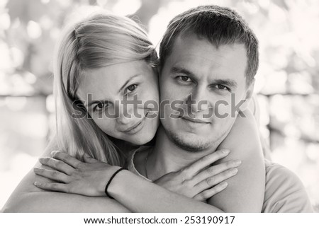 blonde woman and man feelings gentle love embrace black, white