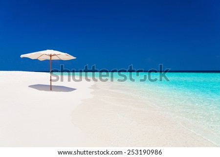 parasol  in sea tropical  Maldives  romantic  atoll island paradise luxury  resort about coral reef