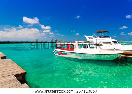 beautiful boat Maldives  atoll island paradise luxury  resort about coral reef in transparent water