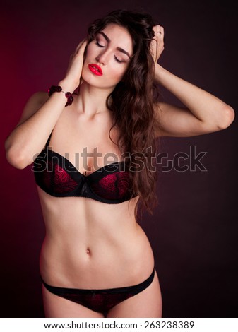 beautiful sensuality elegance lady woman serious face with red underwear bra panties, studio portrait professional light, nature romantic wellness, gloss  hair brunette, background sport slim body
