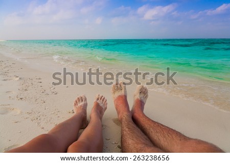 beautiful tan women and man legs blue sun sea tropical nature background holiday luxury  resort island atoll about coral reef, spa