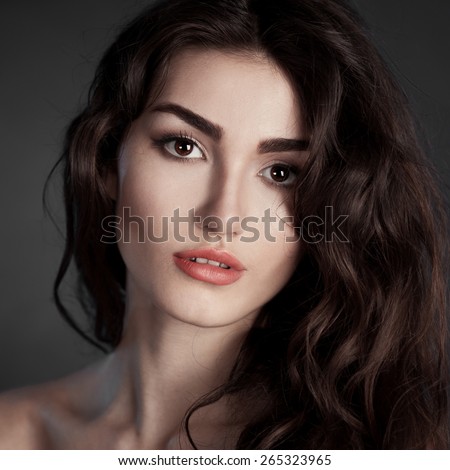 beautiful sensuality elegance lady woman serious face with brown eyes studio portrait professional light nature romantic wellness pure gloss hair brunette black background