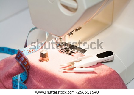 beautiful background sewing electric machine woman leisure lifestyle, shallow depth of field