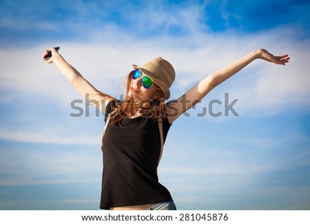 beautiful sensuality elegance lady haired woman happy fun cheerful smiling blue sunglasses black t-shirt hat urban city portrait nature slim sport body space impressions
