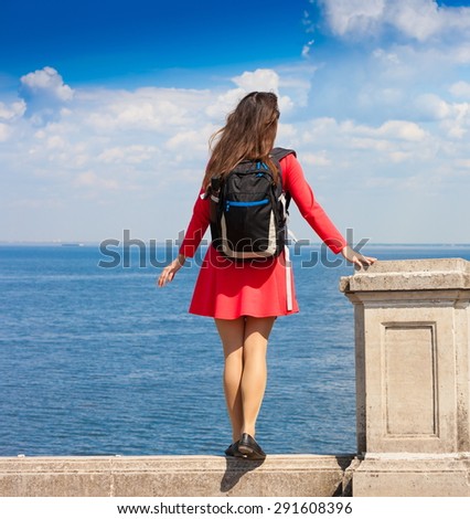 amazing beautiful elegance back haired hair woman red dress black backpack blue sea ocean lake water sport body way horizon portrait nature urban city day