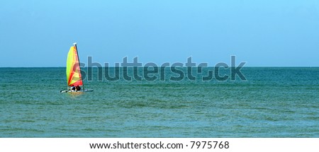 men in sailboat sailing in ocean