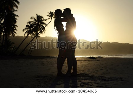 kissing couple silhouette. silhouette kissing couple