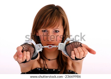 stock photo angry woman arrested with handcuffs Save to a lightbox 