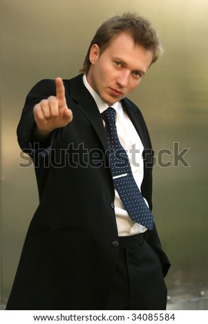 businessman pointing with finger
