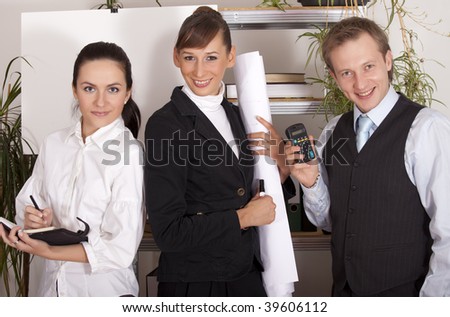 happy business team posing in a office