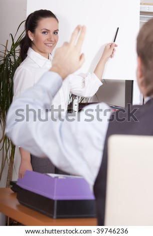 man asking woman by conference in a office