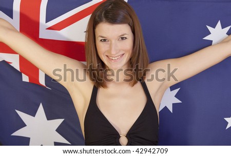 beautiful woman in bikini over australian flag