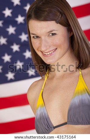 beautiful woman in bikini over american flag