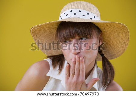 portrait of innocent woman covering her mouth with hand